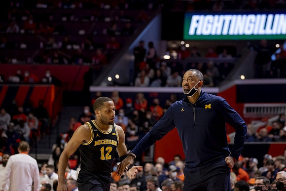 DeVante' Jones (12) and Juwan Howard