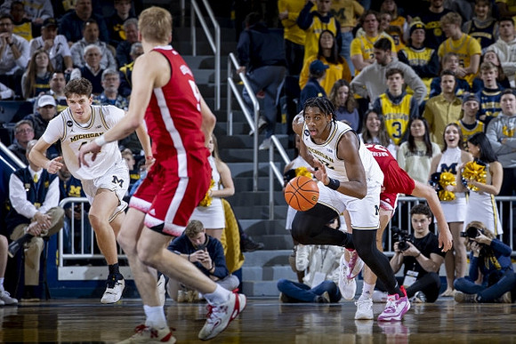 Will Tschetter (42) and Tarris Reed Jr. (32)