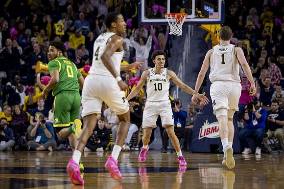 Nimari Burnett (4), Justin Pippen (10), and Danny Wolf (1)