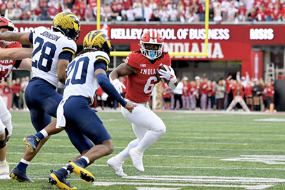 Quinten Johnson (28) and Jyaire Hill (20)
