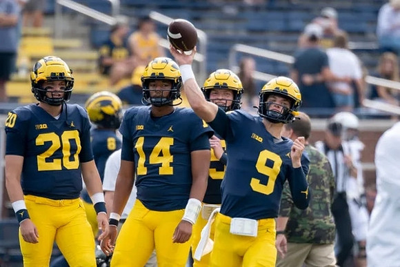 Andy Maddox (20), Roman Wilson (14), and J.J. McCarthy (9)