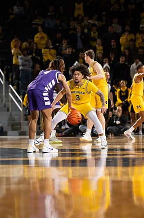 Tre Donaldson (3), Danny Wolf (1), and Nimari Burnett (4)