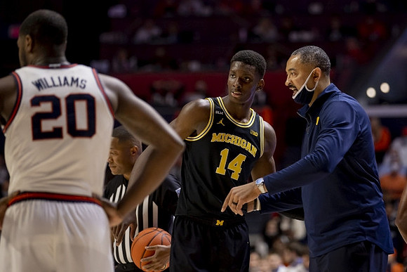 Moussa Diabate (14) and Juwan Howard