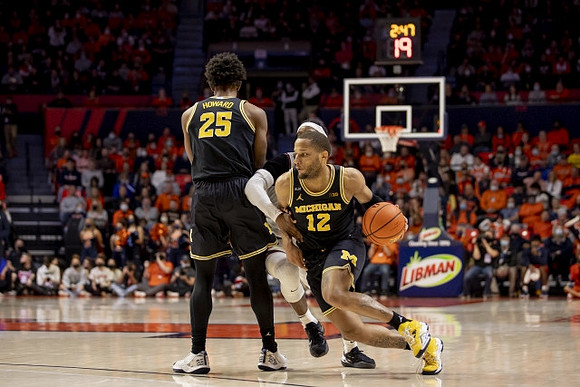 Jace Howard (25) and DeVante' Jones (12)