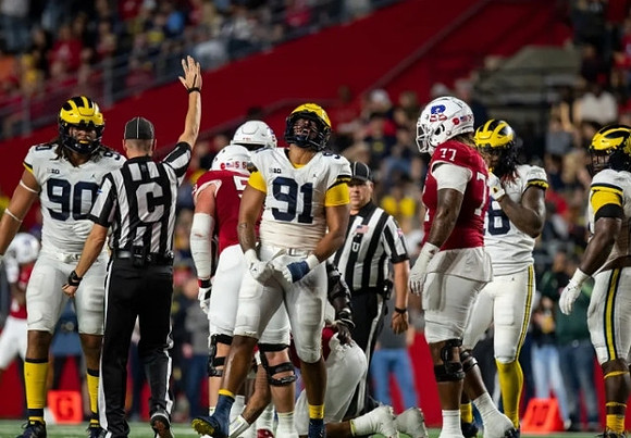 Mike Morris (90), Taylor Upshaw (91), and Eyabi Anoma Okie (18)
