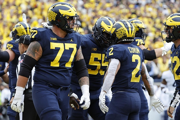 Karsen Barnhart (52), Trevor Keegan (77), Olusegun Oluwatimi (55), Blake Corum (2), Ryan Hayes (76), and Max Bredeson (82)