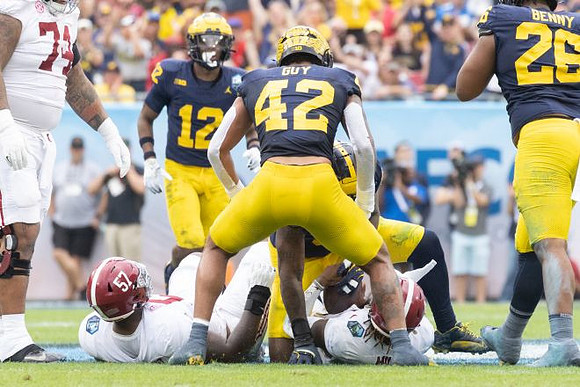 Aamir Hall (12), TJ Guy (42), and Rayshaun Benny (26)