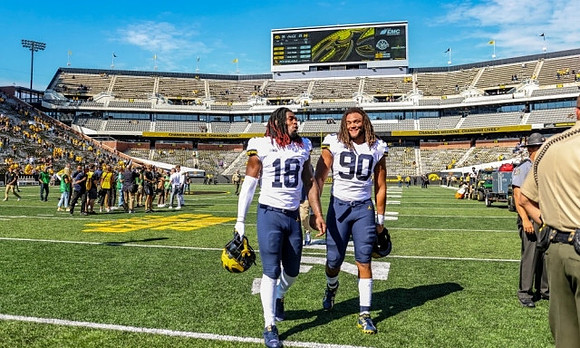 Rod Moore (19) and Mike Morris (90)