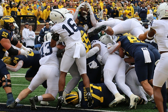 Karsen Barnhart (52), Joel Honigford (84), Trevor Keegan (77), Olusegun Oluwatimi (55), Blake Corum (2), and Max Bredeson (82)