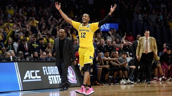 Muhammad-Ali Abdur-Rahkman (12) and Florida State Head Coach Leonard Hamilton