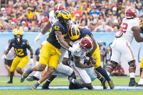 Aamir Hall (12), TJ Guy (42), and Derrick Moore (8)