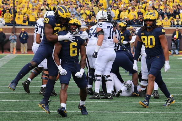 Kalel Mullings (20), R.J. Moten (6), and Mike Morris (90)