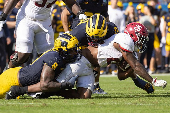 Derrick Moore (8) and Aamir Hall (12)