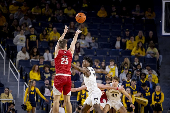 L.J. Cason (2) and Will Tschetter (42)