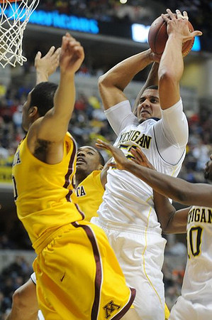 Jordan Morgan (52) and Tim Hardaway Jr. (10)