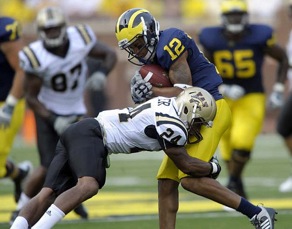 Roy Roundtree (12) and Patrick Omameh (65)