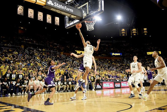 Roddy Gayle Jr. (11), Vladislav Goldin (50), Danny Wolf (1), and Nimari Burnett (4)