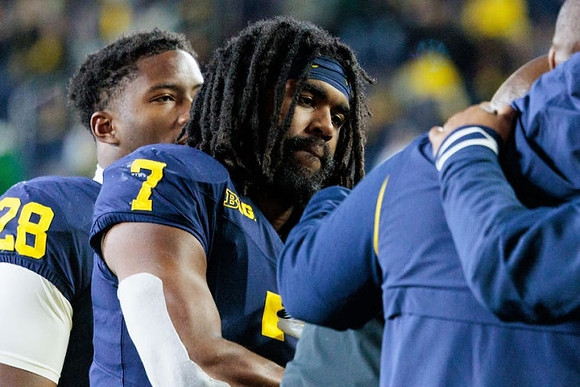 Benjamin Hall (28) and Donovan Edwards (7)