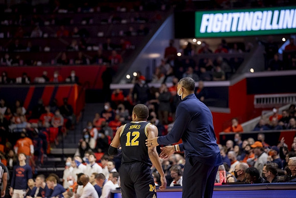 DeVante' Jones (12) and Juwan Howard