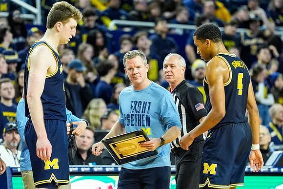 Danny Wolf (1), Dusty May, and Nimari Burnett (4)