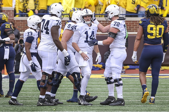 Kalel Mullings (20) and Mike Morris (90)