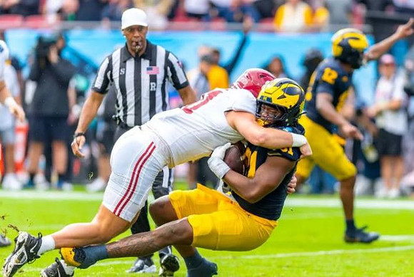 Cameron Brandt (91) and Aamir Hall (12)