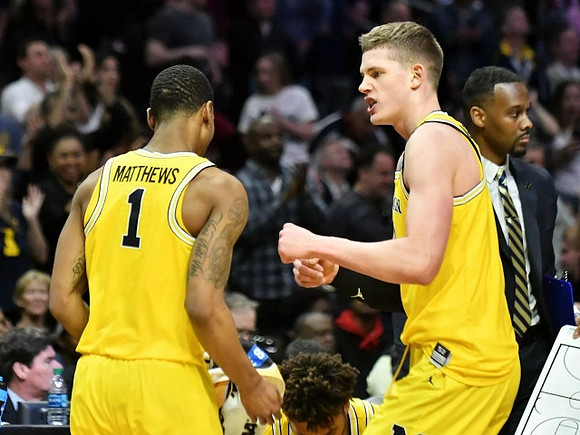 Charles Matthews (1) and Moritz Wagner (13)
