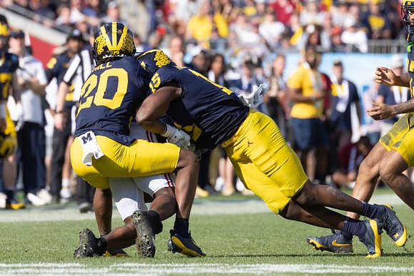 Jyaire Hill (20) and Ernest Hausmann (15)
