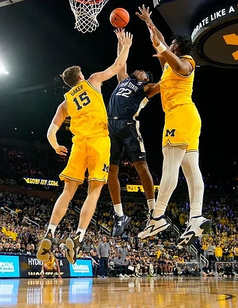 Joey Baker (15) and Tarris Reed Jr. (32)