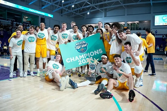Michigan Team and Fort Myers Tip-Off Championship Trophy