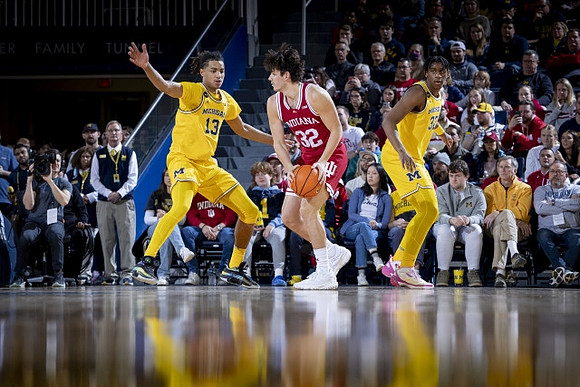 Jett Howard (13) and Tarris Reed Jr. (32)