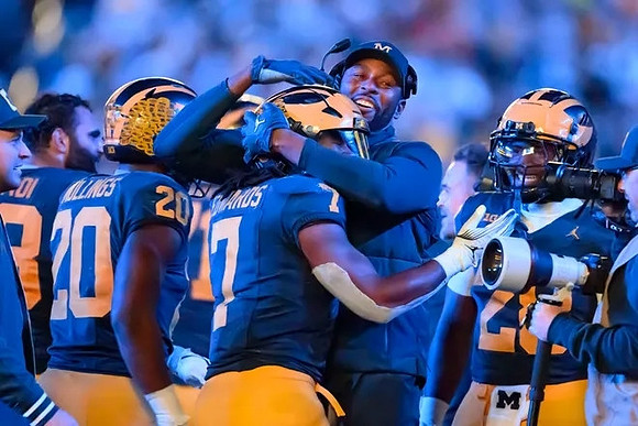 Sherrone Moore and Michigan Team
