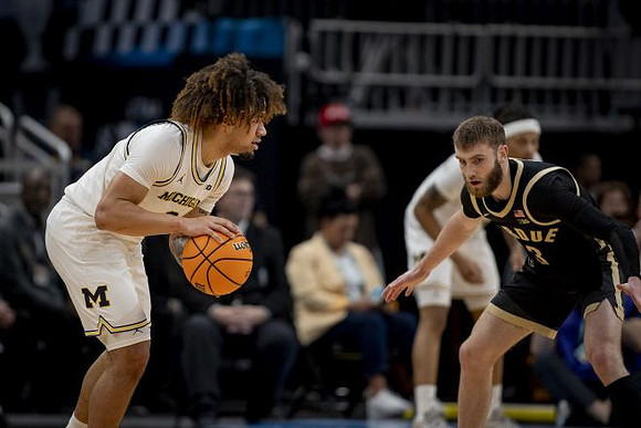 Tre Donaldson (3) and Rubin Jones (15)