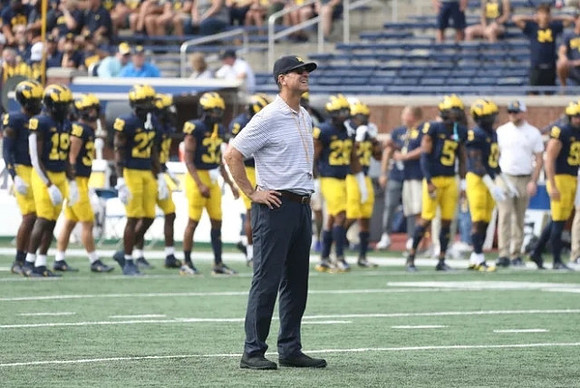 Jim Harbaugh and Michigan Team