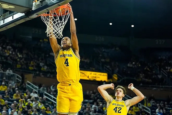 Nimari Burnett (4) and Will Tschetter (42)