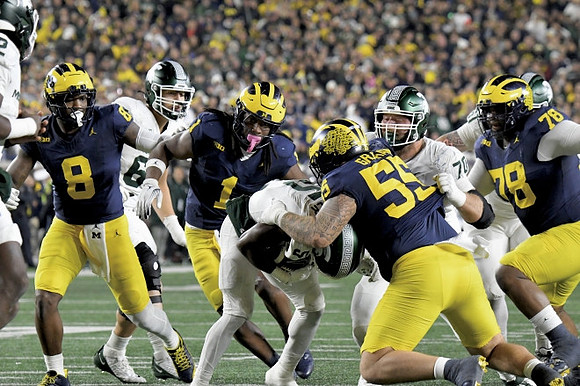 Derrick Moore (8), Jaishawn Barham (1), Mason Graham (55), and Kenneth Grant (78)