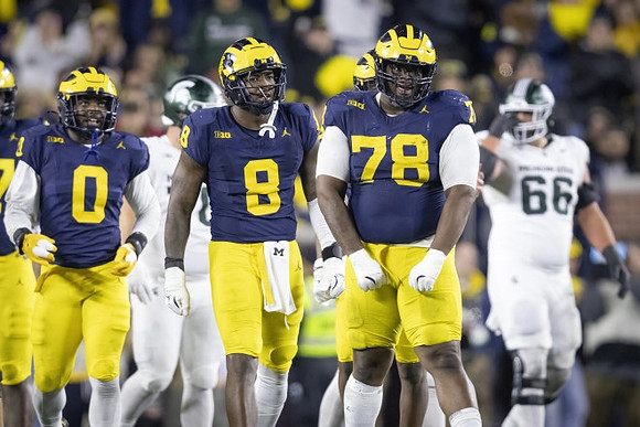 Josaiah Stewart (0), Derrick Moore (8), and Kenneth Grant (78)