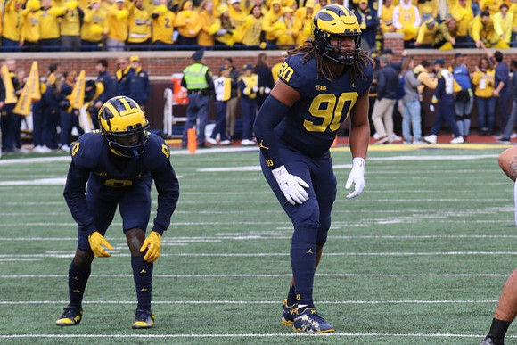 Mike Sainristil (0) and Mike Morris (90)