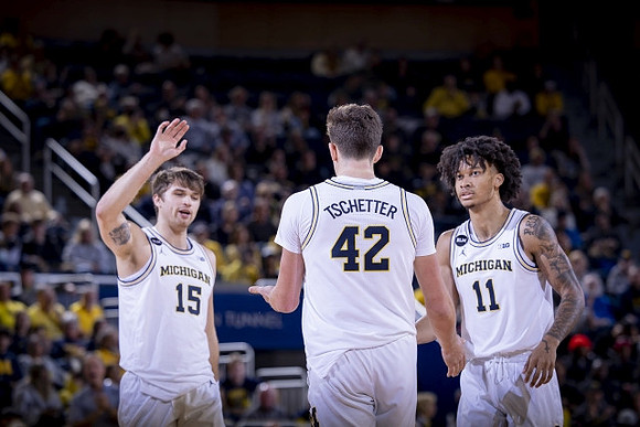 Joey Baker (15), Will Tschetter (42), and Isaiah Barnes (11)