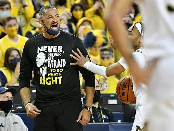 Juwan Howard and Frankie Collins (10)