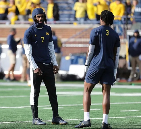 Donovan Edwards (7) and A.J. Henning (3)