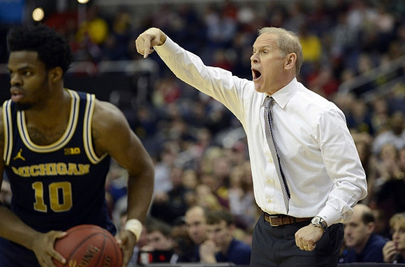 Derrick Walton Jr. (10) and John Beilein