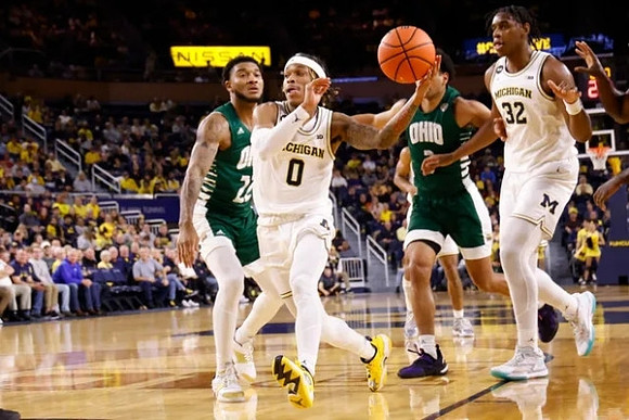 Dug McDaniel (0) and Tarris Reed Jr. (32)