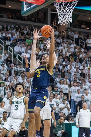 Kobe Bufkin (2) and Michigan State Head Coach Tom Izzo
