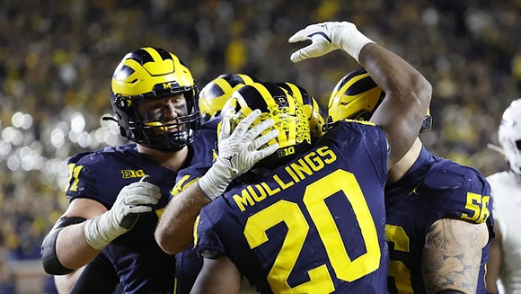 Peyton O'Leary (81), Max Bredeson (44), Kalel Mullings (20), and Dominick Giudice (56)