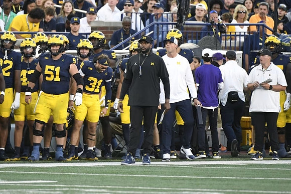 Sherrone Moore and Michigan Team