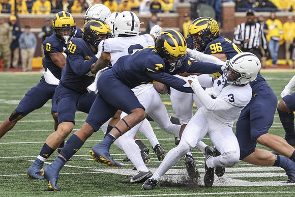 Mike Sainristil (0), Jimmy Rolder (30), Micah Pollard (4), and Julius Welschof (96)