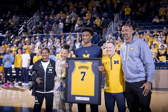 Jace Howard (7), Dusty May, and Juwan Howard