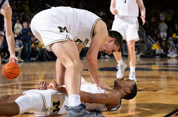 Will Tschetter (42) and Nimari Burnett (4)