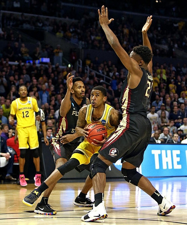 Muhammad-Ali Abdur-Rahkman (12) and Charles Matthews (1)